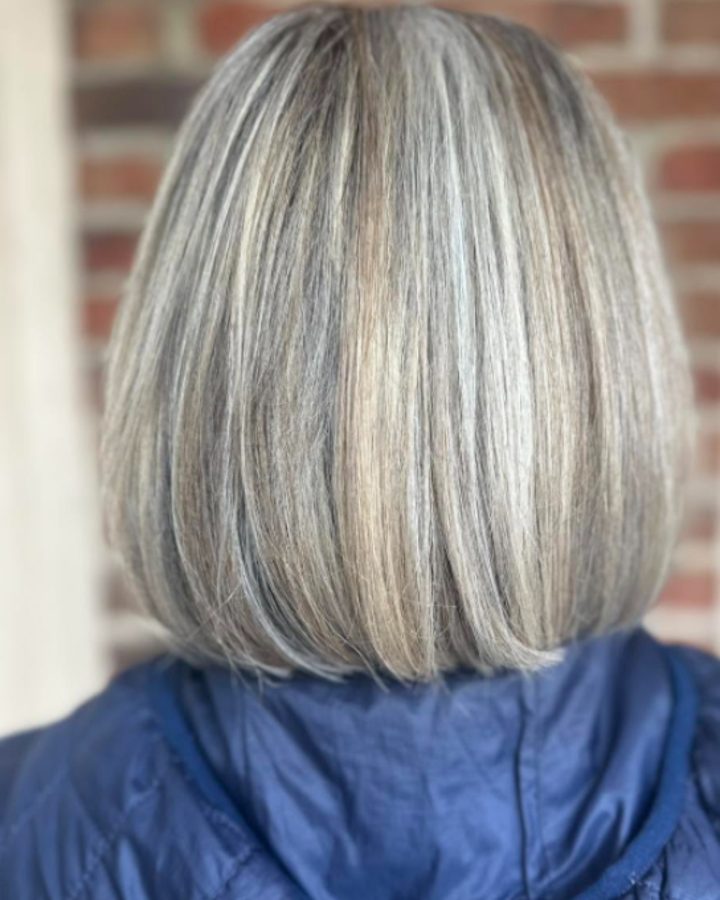 Blunt bob with natural gray blended into soft blonde highlights
