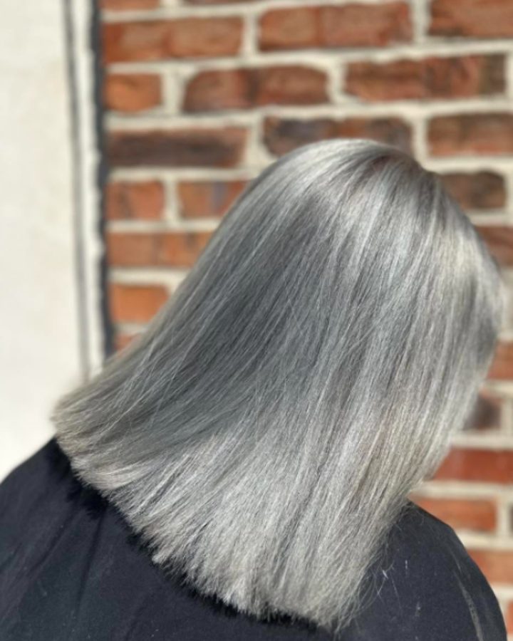 Straight silver lob with a glossy finish, seen from behind